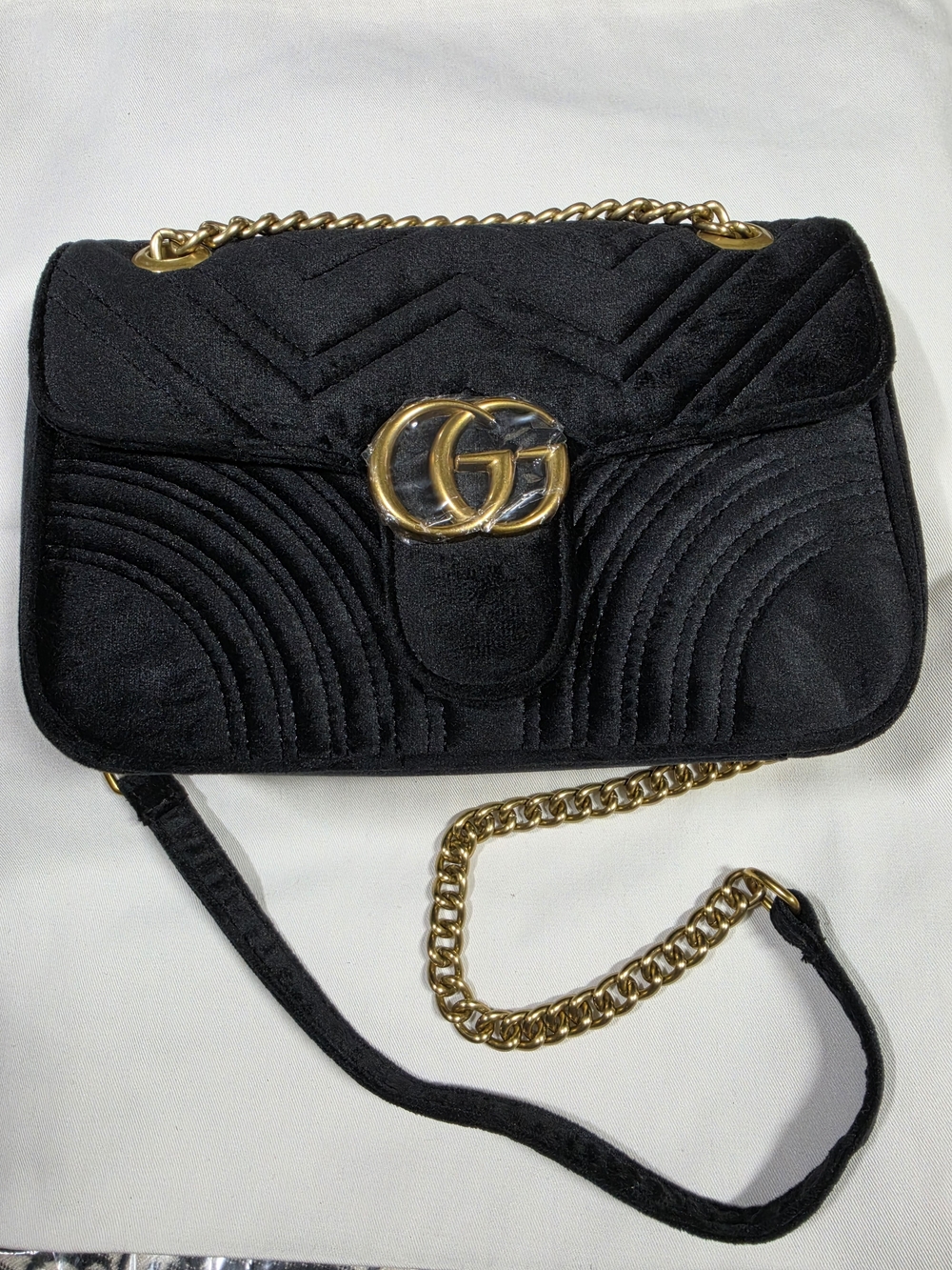 Black Quilted Shoulder Bag with Gold Hardware